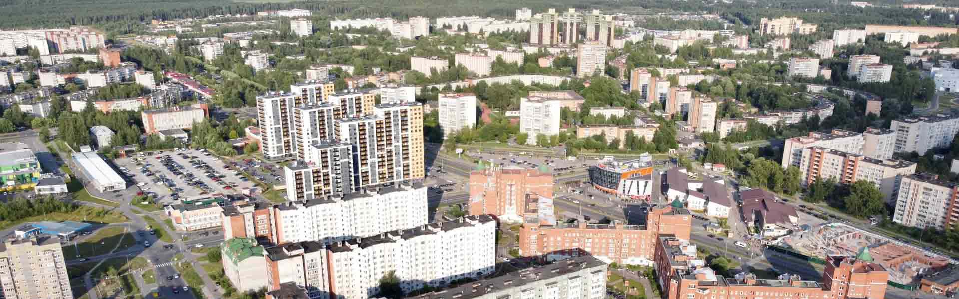Neon color image of a band playing and people singing along