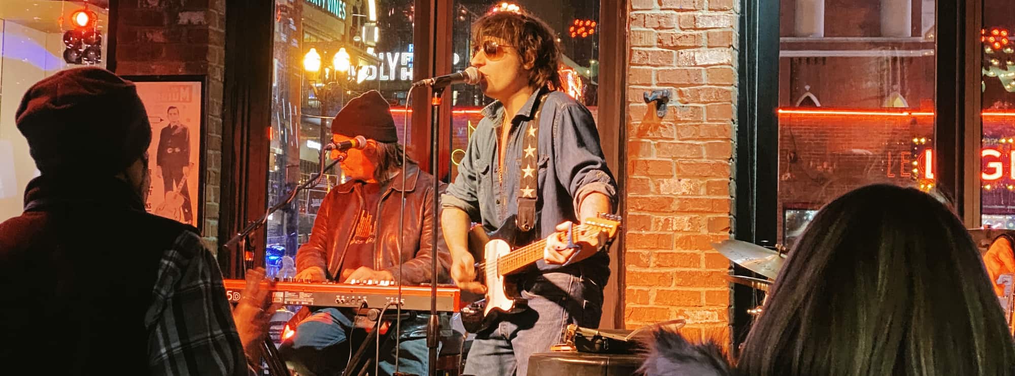 bar singer on guitar in Lancaster