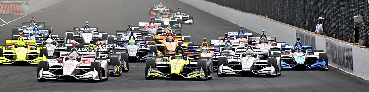 indy cars racing to through the start line Lancaster